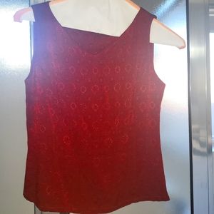 Harold’s sleeveless red textured blouse